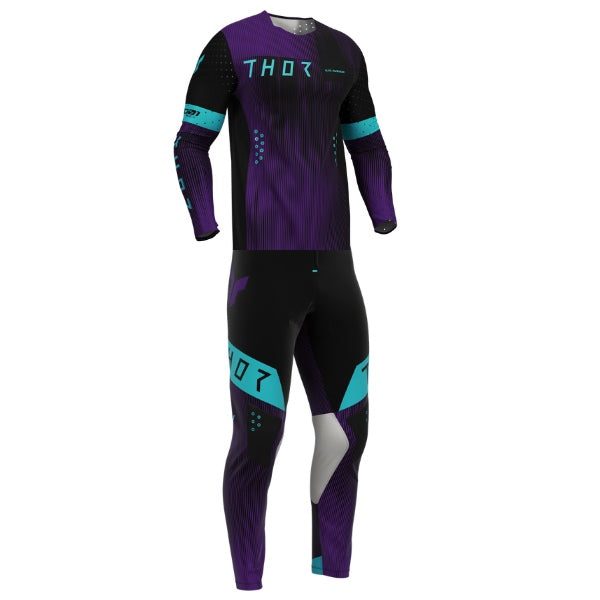 THOR Sportmode Vanish Jersey, Pant Combo in Black/Purple, complete jersey-and-pants set shown from the front, featuring a speckled color gradient with angular rib-like stripes and large THOR logos. Available colors Black/Purple, Black/Red, Gray/Deep Blue, White/Black.