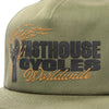 SKU 3210050 – Close-up of Fasthouse Spanner Hat front panel in olive green, highlighting raised “Fasthouse Cycles Worldwide” embroidery and flaming wrench logo, a staple accessory for motocross and off-road style.