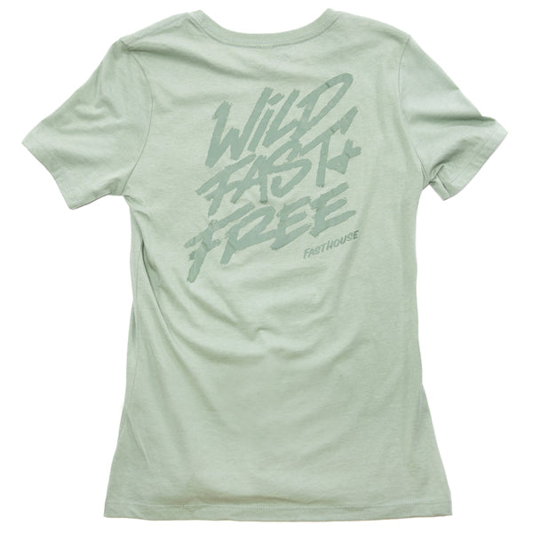 Close-up of front chest logo on Fasthouse Wild Fast and Free women’s motocross tee, SKU 32111604. The “FH” design is printed in brush-stroke style on worn sage fabric.