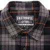 Crisp studio image on a white background of Fasthouse; showing flannel shirt fit, button front, and plaid pattern; SKU 3297925704