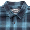Crisp studio image on a white background of Fasthouse; showing flannel shirt fit, button front, and plaid pattern; SKU 3297920205
