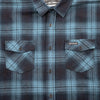 High-resolution studio image of Fasthouse Saturday Night Special Flannel; showing flannel shirt fit, button front, and plaid pattern; SKU 3297920304