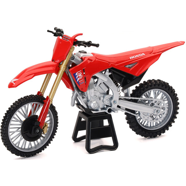 Red 1:12 scale New Ray Toys Honda 2025 CRF45R miniature race bike model on display stand with detailed knobby tires, front fork, engine block, and Honda graphics SKU: 959-0201
