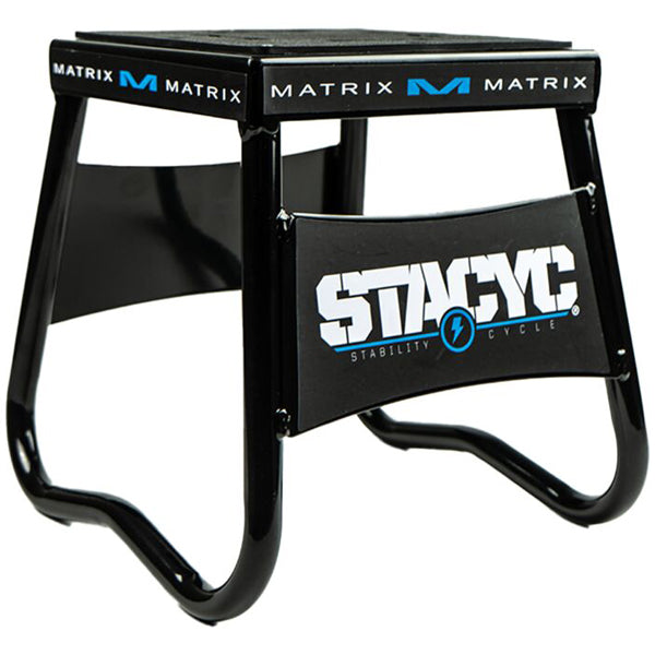 Angled view of STACYC Moto Stand upright bike storage stand