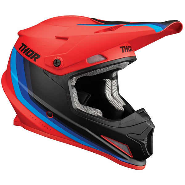 Studio view of Thor Thor - Sector Runner Mips Helmet helmet, in Red and Blue, MIPS-equipped, vented chin bar and intake ports, on a clean white background, for motocross / off-road use, (SKU 011072) Colors: Black and White, Gray and Teal, Navy and White, Red and Blue Sizes: 2XL, LG, MD, SM, XL, XS